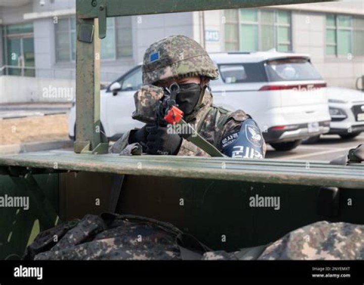 How do I contact the Military Police in Wiesbaden?