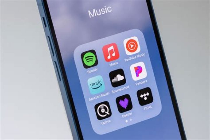 How do I stream music on my iPhone?