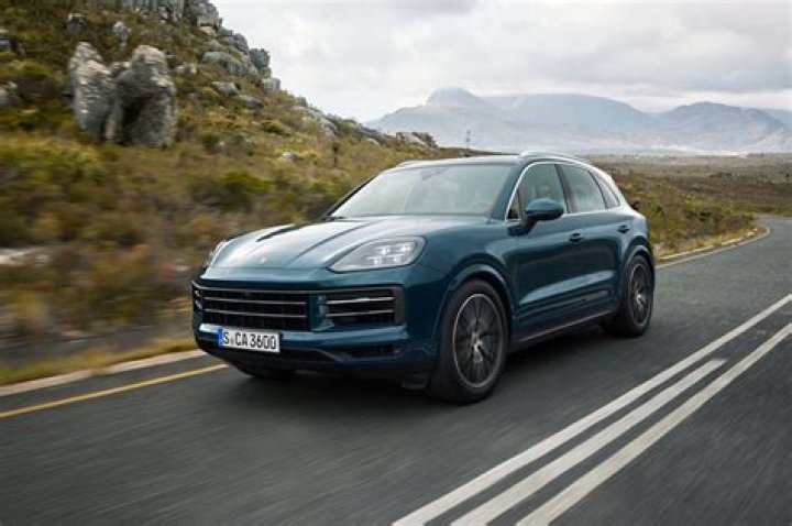 How do you activate the launch control on a Porsche Cayenne?