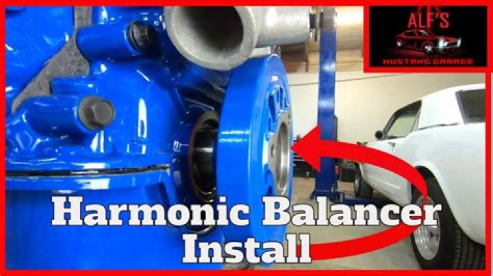 How do you hold a harmonic balancer in place?