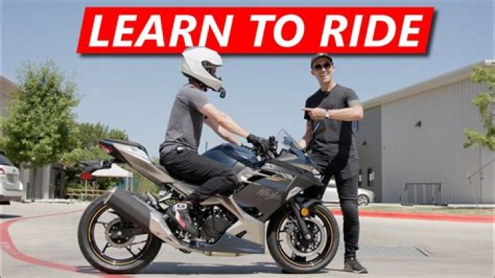 How do you ride a motorcycle at a slow speed?