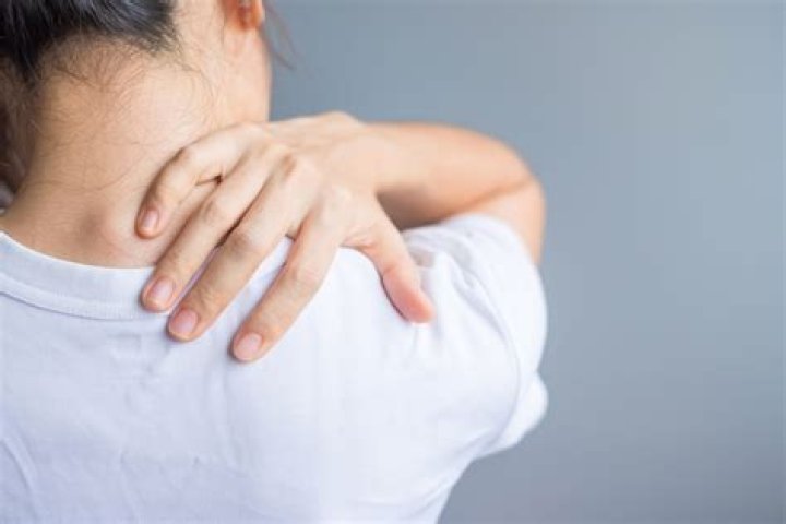How do you treat a Grade 1 shoulder sprain?