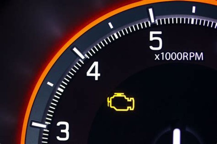 What causes rough idle and check engine light?